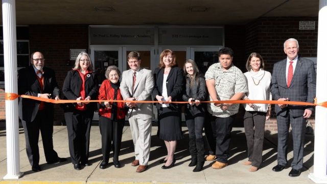 Dr. Paul Kelley Academy Ribbon Cutting at Lincoln Park School, December, 2018. Dr. Michael Durnil, Board Member Jennifer Owen, Mrs. Norma Kelley, Dr. Kelley's Son, Principal Janice Cook, Two Academy Students, Board Chair Terry Hill, Superintendent Bob Thomas